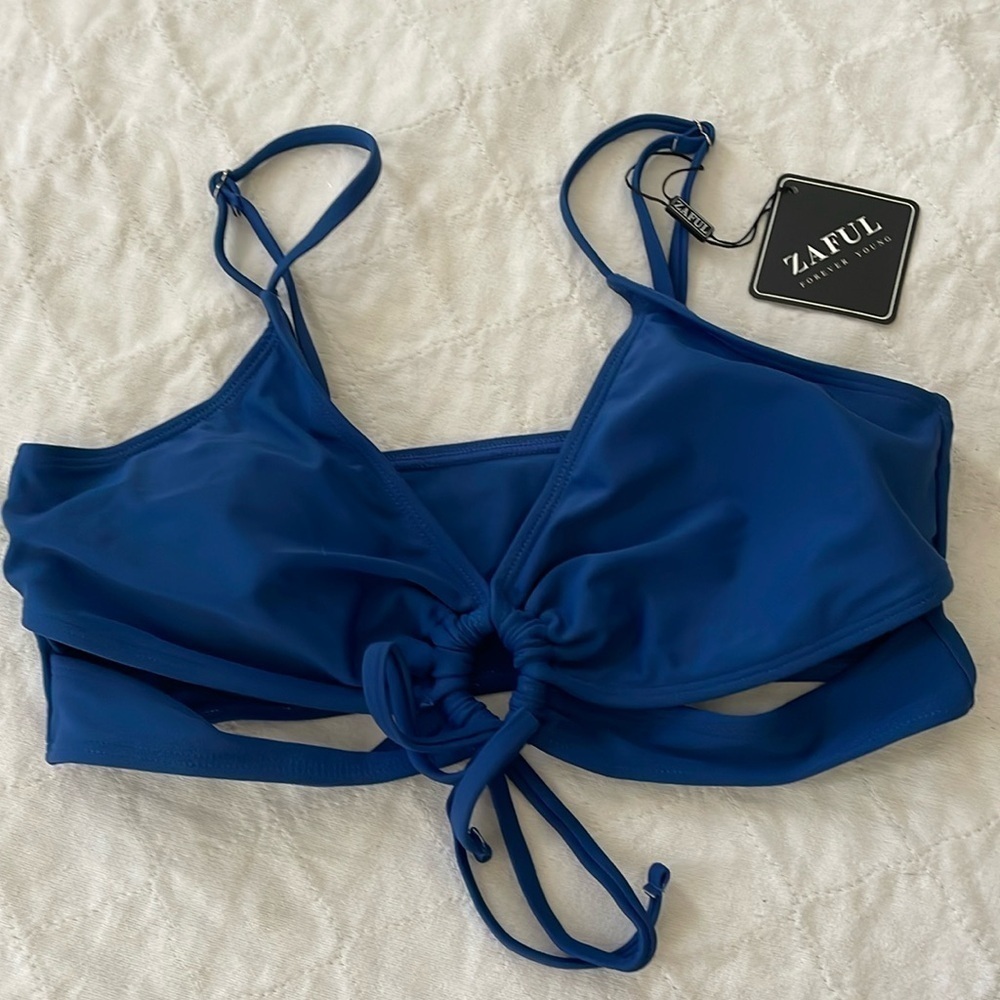Blue bikini top new with tags by Zaful forever young size medium/6 A44